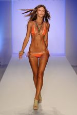 A model walks the runway for the Crystal Jin show during Mercedes Benz Fashion Week Swim 2012 at The Raleigh on July 15, 2011 in Miami Beach, Florida (4).JPG
