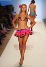 A model walks the runway at the Aguaclara show during Merecedes-Benz Fashion Week Swim 2012  on July 18, 2011 in Miami Beach, United States (2).JPG