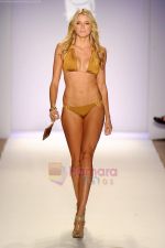 A model walks the runway at the Jogo Beach show during Merecedes-Benz Fashion Week Swim 2012 on July 18, 2011 in Miami Beach, United States (2).JPG