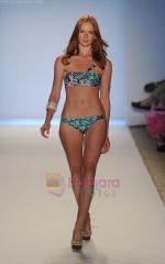 A model walks the runway at the Zingara  show during Merecedes-Benz Fashion Week Swim 2012 on July 18, 2011 in Miami Beach, United States (4).JPG