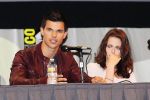 Taylor Lautner, Kristen Stewart poses to promote Breaking Dawn from the Twilight Saga at  the 2011 Comic-Con International Day 1 at the San Diego Convention Center on July 21, 2011 (2).jpg