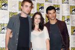 Taylor Lautner, Kristen Stewart, Robert Pattinson poses to promote Breaking Dawn from the Twilight Saga at  the 2011 Comic-Con International Day 1 at the San Diego Convention Center on July 21, 2011 (13).jpg