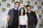 Taylor Lautner, Kristen Stewart, Robert Pattinson poses to promote Breaking Dawn from the Twilight Saga at  the 2011 Comic-Con International Day 1 at the San Diego Convention Center on July 21, 2011 (18).jpg