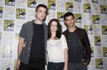 Taylor Lautner, Kristen Stewart, Robert Pattinson poses to promote Breaking Dawn from the Twilight Saga at  the 2011 Comic-Con International Day 1 at the San Diego Convention Center on July 21, 2011 (4).jpg