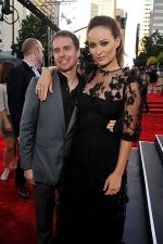 Sam Rockwell and Olivia Wilde arrives at the world premiere of the movie Cowboys and Aliens at San Diego Civic Theatre on July 23, 2011 in San Diego, California.jpg