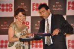 Madhuri Dixit, Sanjeev Kapoor at Food Food media meet in Taj Land_s End, Mumbai on 27th July 2011 (10).JPG