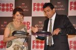 Madhuri Dixit, Sanjeev Kapoor at Food Food media meet in Taj Land_s End, Mumbai on 27th July 2011 (11).JPG