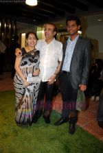 suresh watkar  with wife and  vihang sarnaik at Pratap Sarnaik birthday party in Mumbai on 28th July 2011.JPG