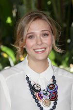 Elizabeth Olsen attends the 2011 Hollywood Foreign Press Association Annual Installation Luncheon in Beverly Hills Hotel, CA on 4th August 2011 (4).jpg