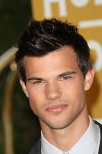 Taylor Lautner attends the 2011 Hollywood Foreign Press Association Annual Installation Luncheon in Beverly Hills Hotel, CA on 4th August 2011 (11).jpg
