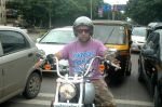 Vishal Dadlani snapped on his bike on a busy road in Mumbai on 22nd Aug 2011 (4).JPG