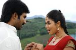 Shamna Kasim (Poorna), Sai Pradeep Pinisetty (Aadhi) in Chelagatam Movie Stills (20).jpg