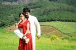 Shamna Kasim (Poorna), Sai Pradeep Pinisetty (Aadhi) in Chelagatam Movie Stills (21).jpg