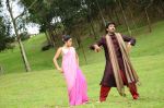 Shamna Kasim (Poorna), Sai Pradeep Pinisetty (Aadhi) in Chelagatam Movie Stills (30).jpg