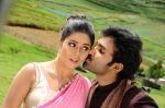 Shamna Kasim (Poorna), Sai Pradeep Pinisetty (Aadhi) in Chelagatam Movie Stills (31).jpg