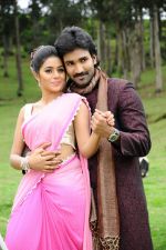 Shamna Kasim (Poorna), Sai Pradeep Pinisetty (Aadhi) in Chelagatam Movie Stills (33).jpg