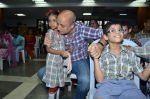 Anupam Kher at the screening of Havai Dada for kids of ADAPT (Able Disable All People together) in Spastics Society, Bandra on 17th Sept 2011 (19).JPG