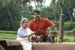 Mohanlal in Snehaveedu Movie Stills (10).JPG