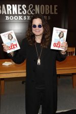 Ozzy Osbourne signs his book _Trust Me, I_m Dr. Ozzy_ at Barnes and Noble at The Grove in Los Angeles on October 15, 2011 (2).jpg