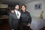 Gulshan Grover with AVS Owner Raju Sethi at AVS Bollywood Party in Le Sutra Gallery on 9th Nov 2011.jpg