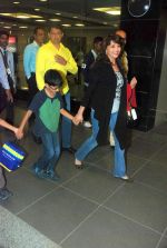 Madhuri Dixit snapped with kids and husband at the airport in Mumbai on 1st Jan 2012 (14).JPG