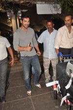 John Abraham snapped at the airport in Mumbai on 4th Jan 2012 (14).jpg