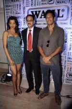 Mugdha Godse, Milind Soman at the launch of World_s leading Grooming brand- WAHL in Mumbai on 14th Jan 2012 (15).JPG