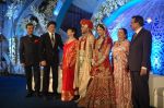 Shah Rukh Khan with Abhinav Jhunjhunwala, Prerna Sarda and Mr and Mrs Sarda at Prerna Ghanshyam Sarda_s wedding to Abhinav Amitabh Jhunjhunwala in Suburban Mumbai on 29th Jan 2012-1.jpg