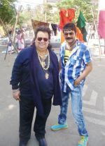 Bappi Lahiri with actor Prosenjit Chatterjee at the song shoot of Ulte Debo Paalte Debo for Eskay Movies_ film Bikram Singho Bappi Lahiri with actor Prosenjit Chatterjee at the song shoot of Ulte Debo Paalte Debo for Eskay Movies_ film Bikram Singho.jpg
