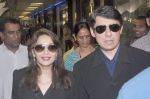 Madhuri dixit snapped with husband in Mumbai Airport on 6th April 2012 (10).jpg
