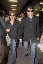 Madhuri dixit snapped with husband in Mumbai Airport on 6th April 2012 (15).jpg