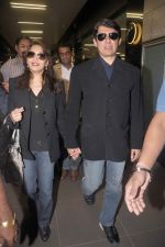 Madhuri dixit snapped with husband in Mumbai Airport on 6th April 2012 (16).jpg