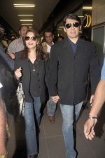 Madhuri dixit snapped with husband in Mumbai Airport on 6th April 2012 (17).jpg