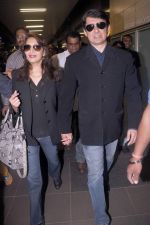 Madhuri dixit snapped with husband in Mumbai Airport on 6th April 2012 (18).jpg