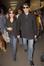 Madhuri dixit snapped with husband in Mumbai Airport on 6th April 2012 (21).jpg