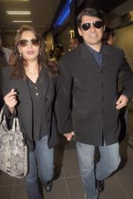 Madhuri dixit snapped with husband in Mumbai Airport on 6th April 2012 (24).jpg