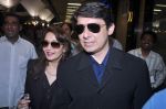 Madhuri dixit snapped with husband in Mumbai Airport on 6th April 2012 (4).jpg