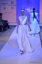 Model walk the ramp for Nitya Bajaj Show at ABIL Pune Fashion Weekon 14th April 2012 (50).JPG