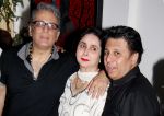 Aditya Raj Kapoor And Ketan Desai With His Wife  At Priyadarshan Success Party.JPG
