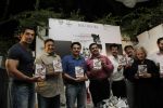 John Abraham, Anil kapoor, Sanjay Gupta unveil Dongri to dubai book  in Olive, Mumbai on 10th May 2012 (24).JPG