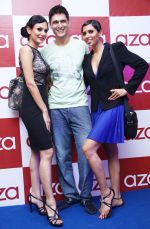 Anchal Kumar, Niketan Modhak and Candice Pinto at the Aza store launch in Ludhiana on 18th May 2012.jpg