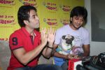 Ritesh Deshmukh, Tusshar Kapoor with dog Macho on the sets of Radio Mirchi to promote Kya Super Kool Hain Hum in Lower parel, Mumbai on 25th June 2012 (36).JPG