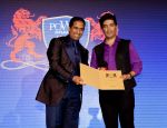 Prof. Chaudhuri awarding Manish Malhotra at the launch of PowerBrands Rising Stars 2012-13 in Dubai on 29th Aug 2012.jpg