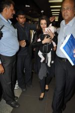 Aishwarya Rai snapped with baby Aaradhya at the Airport on 17th Sept 2012 (16).JPG