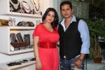 SAMEENA & AZEEM KHAN at the Launch of Azeem Khan_s festive accessory collection in Mumbai on 23rd Oct 2012.JPG
