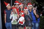 Rakhi Sawant spends Christmas with kids at home in Andheri, Mumbai on 24th Dec 2012 (14).JPG