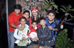 Rakhi Sawant spends Christmas with kids at home in Andheri, Mumbai on 24th Dec 2012 (2).JPG