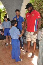 Chris Gayle and Siddharth Mallya spend time with NGO kids in Worli, Mumbai on 26th April 2013 (38).JPG