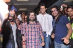 Shahrukh Khan, Abhishek Bachchan, Shahid Kapoor, Pritam Chakraborty arrive from IIFA awards 2013 in Mumbai Airport on 7th July 2013 (100).JPG