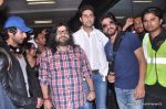 Shahrukh Khan, Abhishek Bachchan, Shahid Kapoor, Pritam Chakraborty arrive from IIFA awards 2013 in Mumbai Airport on 7th July 2013 (99).JPG